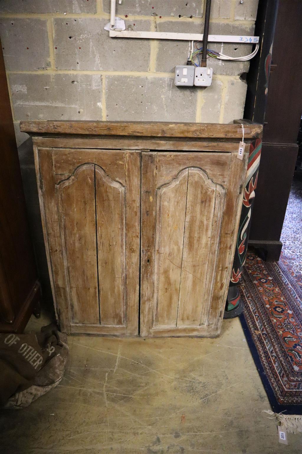 An 18th century two door oak cabinet upper section, width 99cm, depth 27cm, height 119cm